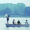 four people on a boat
